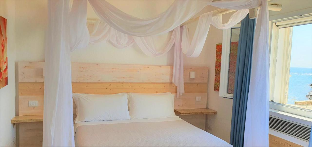 Hotel Lo Scoglio Porto Cesareo Exterior photo